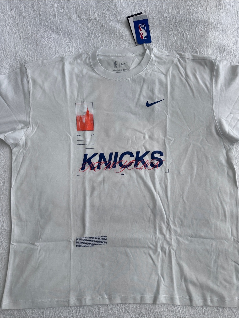 Nike White Knicks Graphic Tee with Blue and Orange Accents